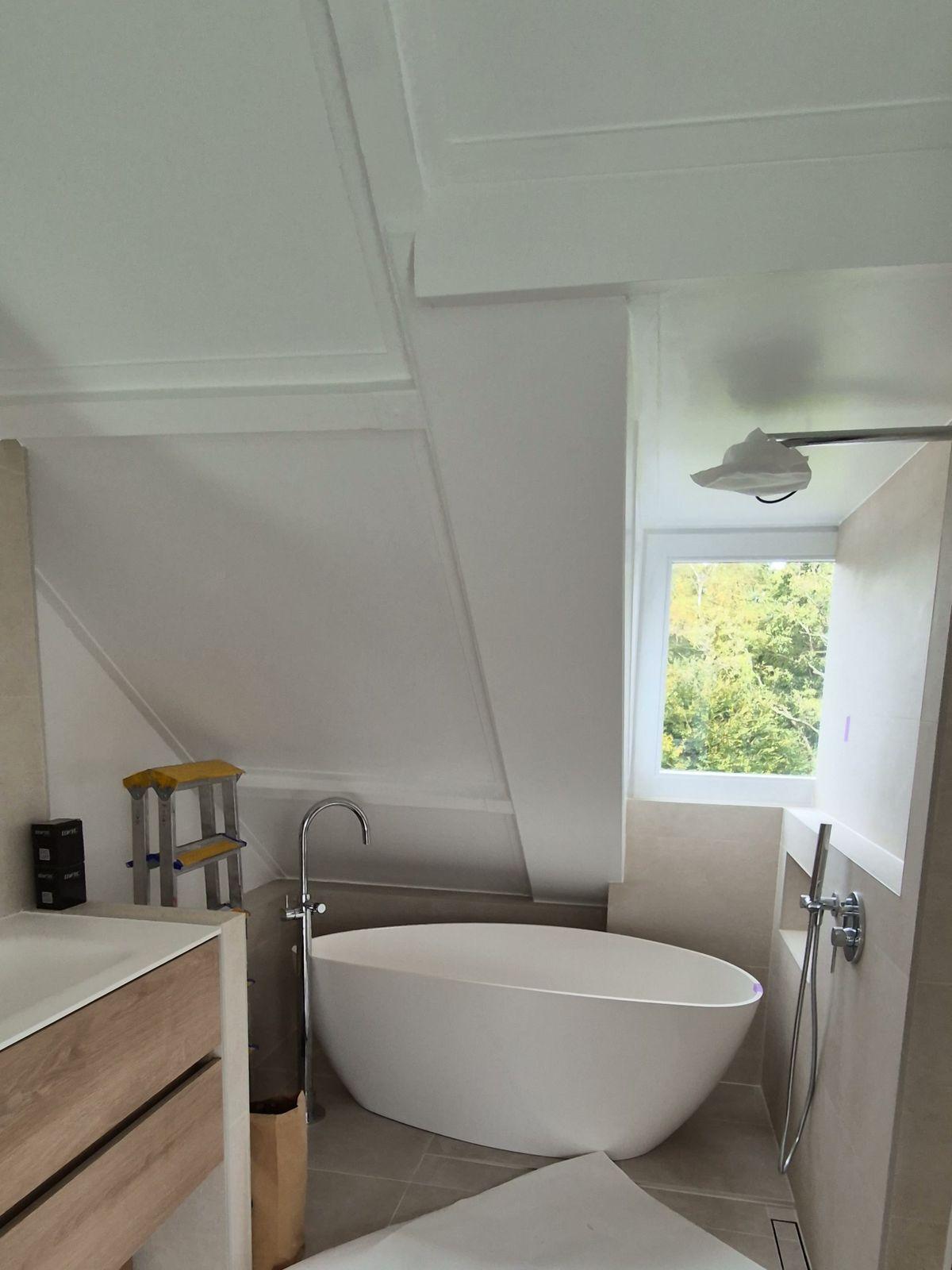 Attic bathroom with a freestanding bath, Amstelveen - after renovation