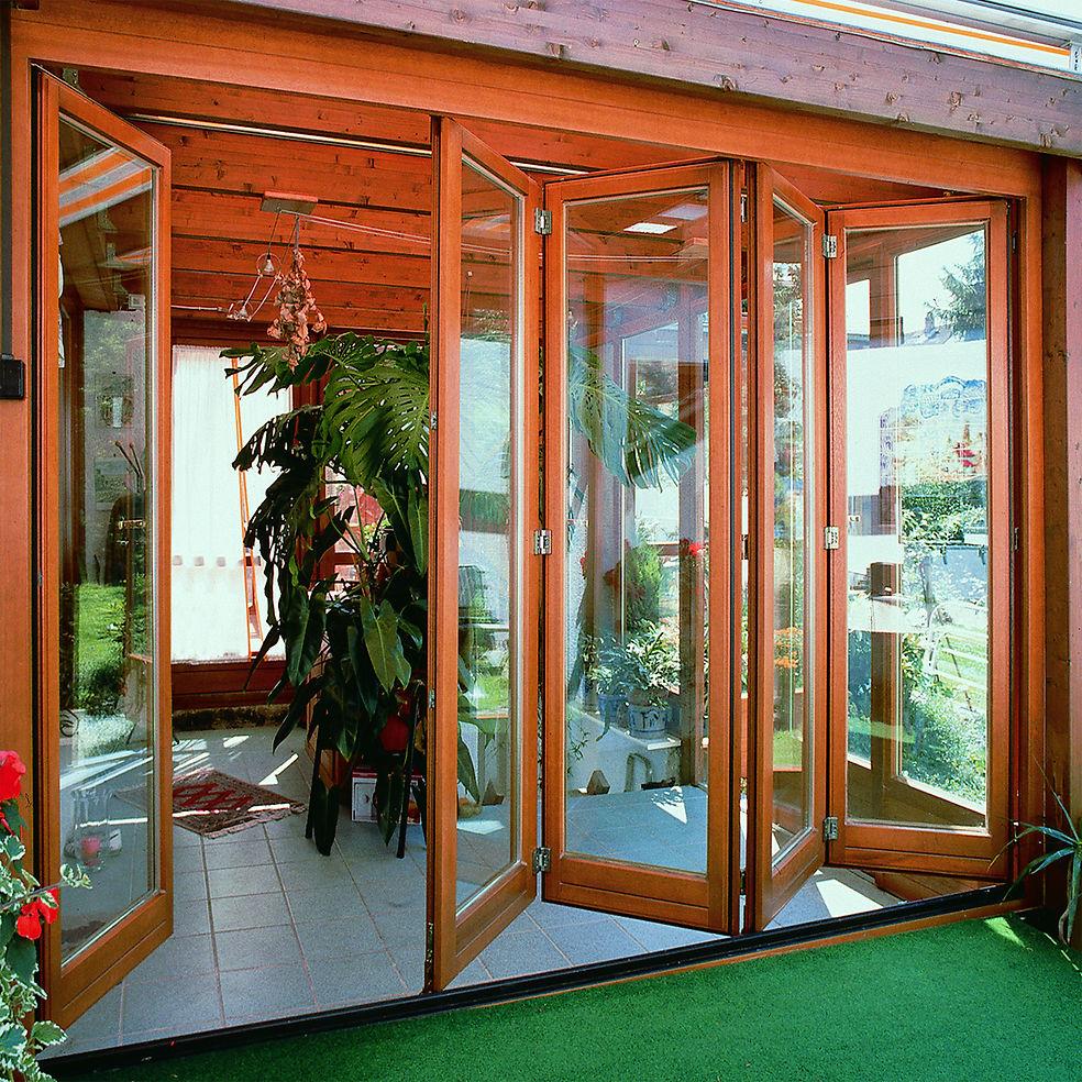 Accordion bi-fold glass doors fully opened
